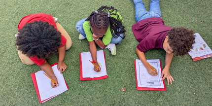Students participating in chapel or Bible class at a Christian school in Clearwater Pinellas County