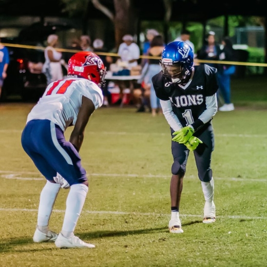 varsity football player takes the field for Lakeside Christian School in Clearwater, Florida